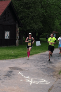 Passing the 3 mile mark at the Green Lakes 8k!